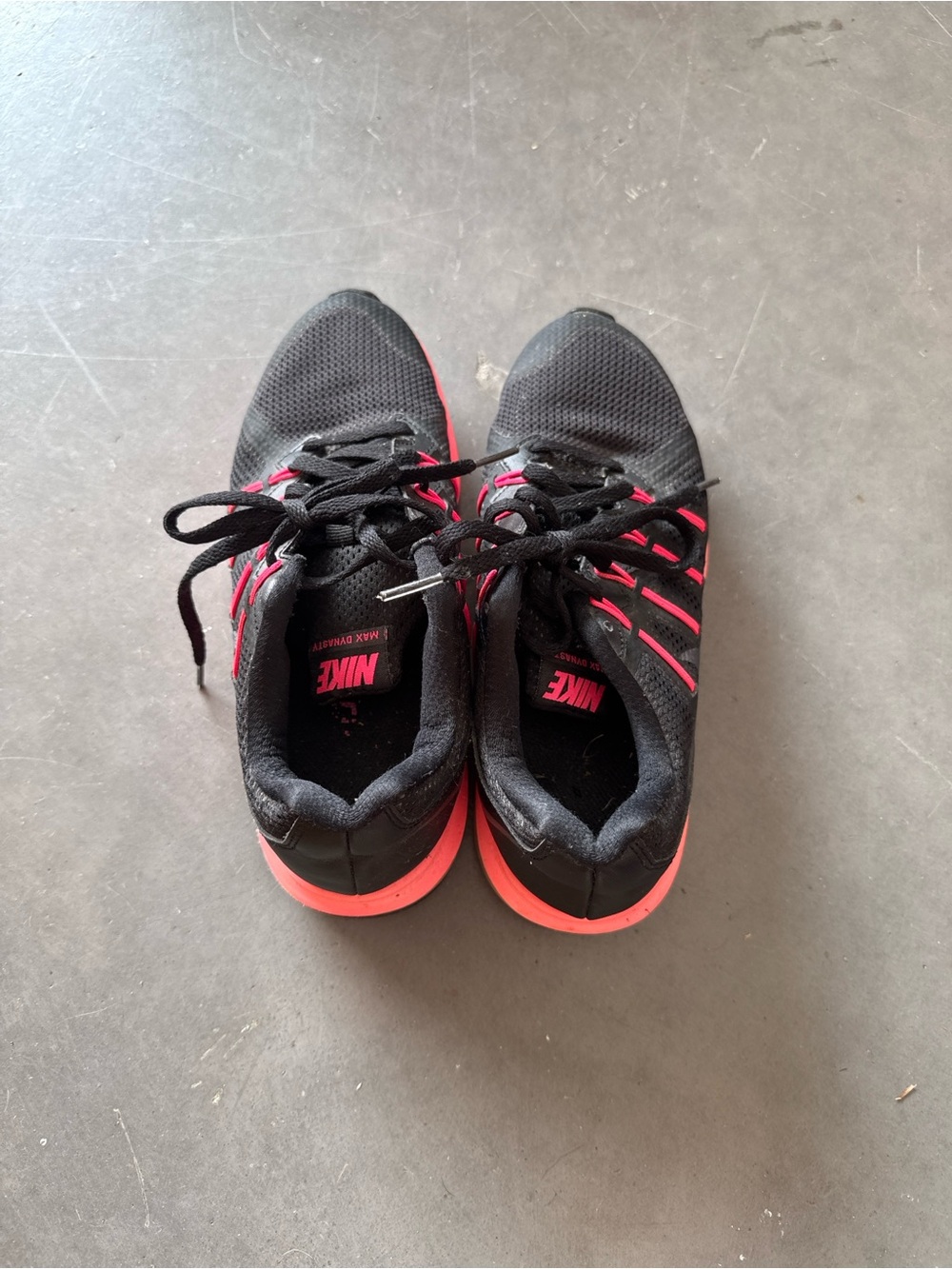 Nike Men's Black Athletic Shoes with Pink Accents